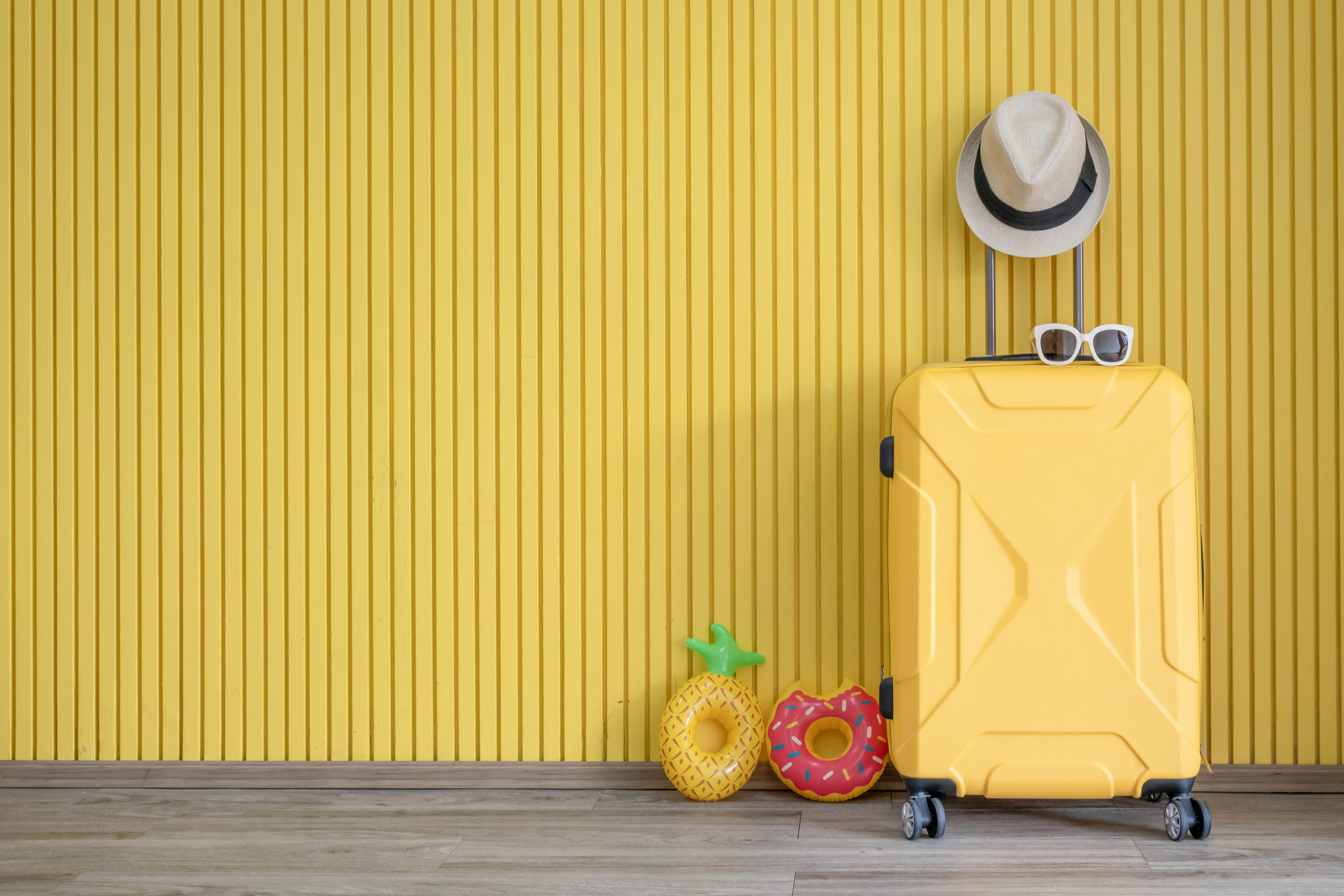 Yellow luggage and with traveler equipment
